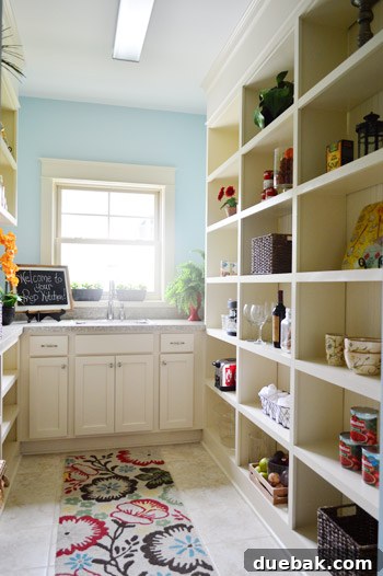 Interior view of the prep kitchen with a sink and ample counter space