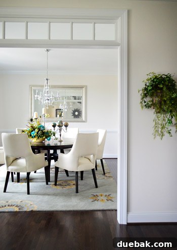 Elegant dining room with a transom window above the doorway
