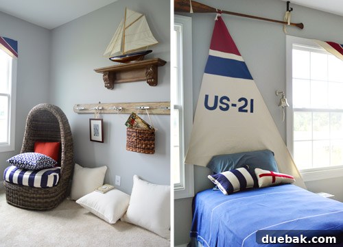 Nautical-themed kids' room with a sail headboard and an egg chair