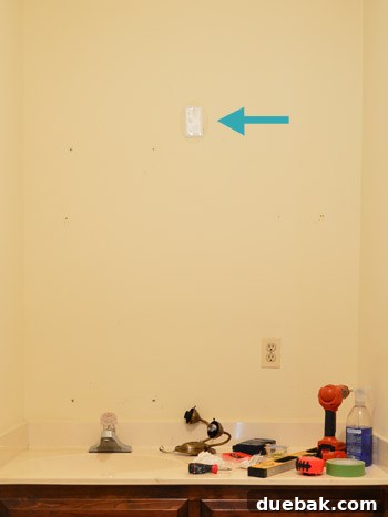 Electrical wires capped and covered after removing the old light fixture