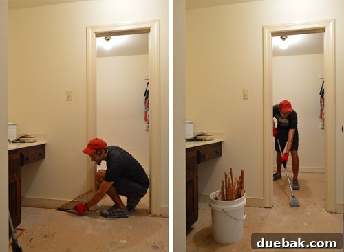 A crowbar used to pry up tack strips from the bathroom subfloor