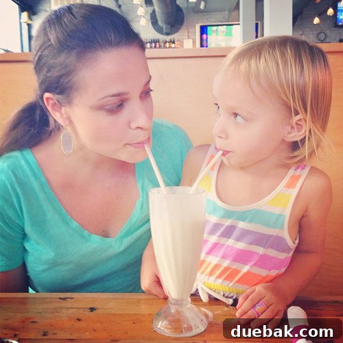 The Second Time Around: What to Expect 6 Clara, a loving big sister-to-be, happily playing with her parents.