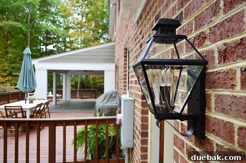 Close-up of new black lantern and door