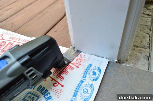 Outdoor Tile Perfection: Leveling and Dry Fitting 14 Undercutting a door jamb using a Dremel Multimax and a tile as a guide