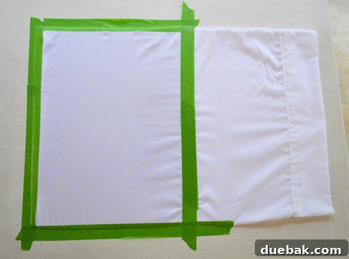Taping the pillowcase for stencil art