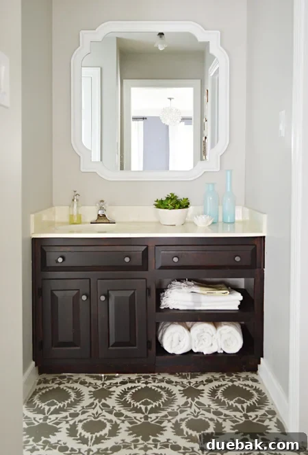 Revere Pewter: The Gray Paint Everyone Raves About 2 Benjamin Moore Revere Pewter painted master bathroom with stenciled floor