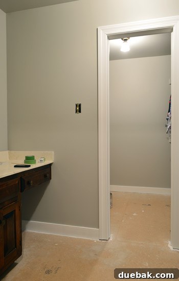 Revere Pewter: The Gray Paint Everyone Raves About 6 Finished wall painted with Benjamin Moore Revere Pewter in a bathroom