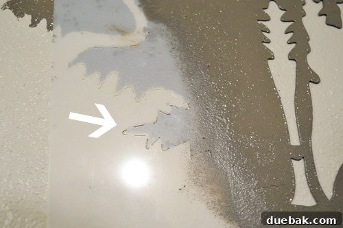 Design Your Dream Floor with Stencils 16 Two people working together to align and place a large floor stencil