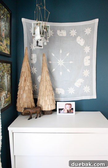 Celestial Blue Dreams: A Boy's Cloud-Kissed Sanctuary 5 Details of the dresser, tapestry, and DIY mobile