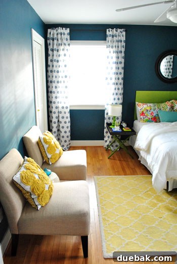 Color Confidence: Your Guide to Perfect Paint Choices 4 Guest room wall painted in muted teal 'Plumage', appearing bold and deep