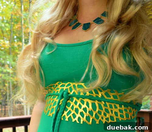 Khaleesi costume with a blonde wig and green dress, showing the overall look.