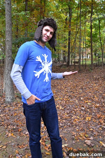 John from the waist up, showing the snowflake design made from white duct tape on his blue t-shirt.