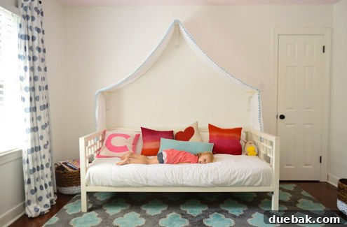 Before Photo Of Daybed With Fabric Canopy In Front Of Blank Wall - A plain white wall above a daybed with a simple fabric canopy.