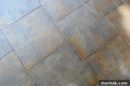 Cleaned outdoor tiled floor, now ready for the grouting process to begin