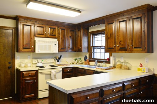How to Remove and Rehang Kitchen Cabinets 2 Kitchen before upper cabinet removal, showcasing brown and beige tones