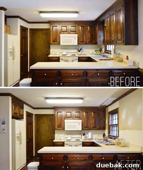 How to Remove and Rehang Kitchen Cabinets 18 Kitchen view showing creamy appliances and off-white counters before paint