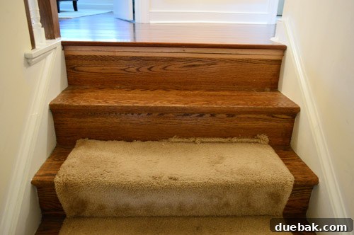 Removing Old Carpet and Stubborn Staples 3 Close-up of old carpet on stairs