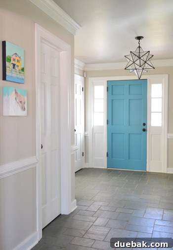 Foyer showcasing Benjamin Moore Edgecomb Gray walls, Benjamin Moore Simply White trim, and a Benjamin Moore Revere Pewter ceiling with an eggshell finish
