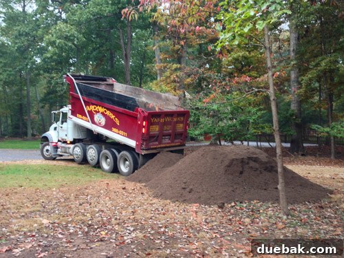 Curb Appeal Mastery 5 One of two large truckloads of topsoil delivered for yard grading