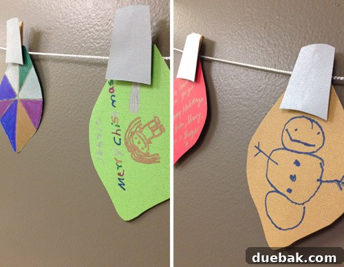 Get Crafting 4 DIY Holiday Decorations 13 Close up of paper Christmas light bulb garland with kid artwork on paper bulbs for Childrens Hospital of Richmond