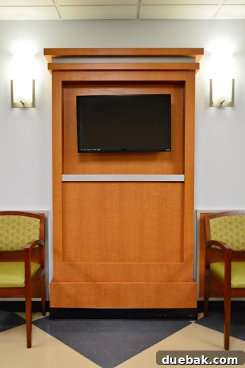 Get Crafting 4 DIY Holiday Decorations 3 Wood mantle with TV in Childrens Hospital waiting room