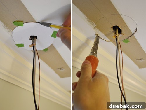 Upgrade Your Lighting: Swapping Fluorescent Fixtures for Pendants 16 Cutting hole in ceiling for light fixture box using jab saw