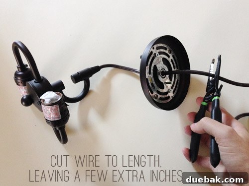 Upgrade Your Lighting: Swapping Fluorescent Fixtures for Pendants 8 Hand cutting wires on dark pendant light fixture cord