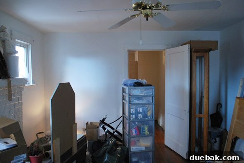 Before photo of the casual sitting room or lounge area.