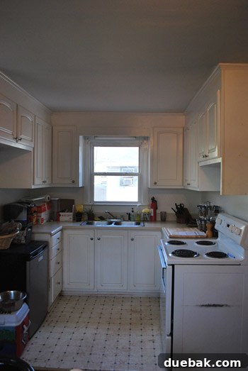Before photo of the original small and awkward kitchen space.