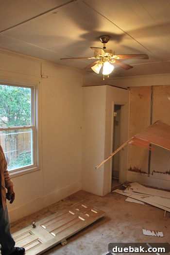 Before photo of the old garage space, previously a poorly converted bedroom.