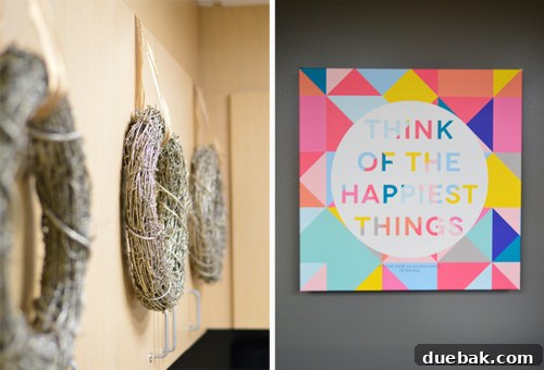 Brightening Little Lives: Our Holiday Hospital Makeover 17 Detail Of Holiday Wreaths And Think Of The Happiest Things Canvas Quote, blending seasonal decor with an inspiring message.