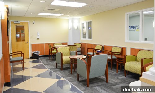 Brightening Little Lives: Our Holiday Hospital Makeover 2 Before Photo Of Hospital Waiting Room, showing a plain, functional, and unadorned space awaiting transformation.