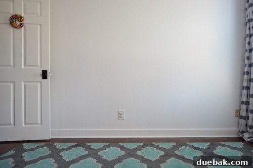 Creating Her Dream Big Girl Room Beyond the Crib 5 The blank wall in Clara's room after crib removal