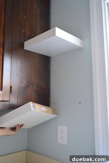 Illustrating how short IKEA LACK floating shelves are securely attached to the kitchen wall, emphasizing their compact and versatile design.