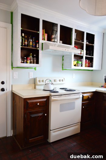 Effortlessly Transform Your Kitchen with White Upper Cabinets 9 Second coat of Kilz Premium primer applied to kitchen cabinet frames.