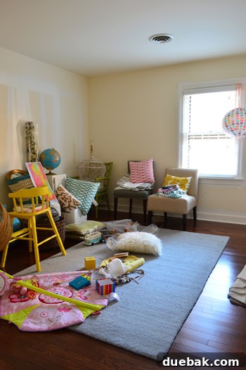 A room filled with miscellaneous items, not yet organized for a nursery