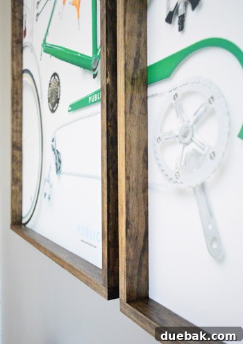 Close-up detail of a rustic homemade wooden frame with a print inside, highlighting craftsmanship