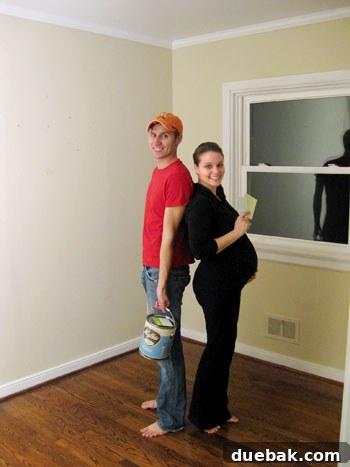 Parents standing in Clara's nursery before renovation, a past cherished memory