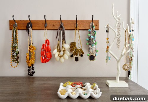 Carrie's functional hook rail displaying statement necklaces
