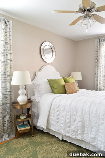 Carrie's bedroom after the adult upgrade, showing the new headboard and mirror