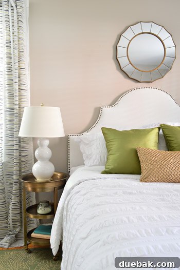 Close-up of the new headboard and bedding, showcasing textures