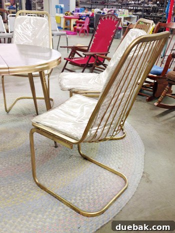 Kitchen's Gilded Past 4 Close-up of a vintage wire chair showing its clean lines and potential for custom seat cushions.