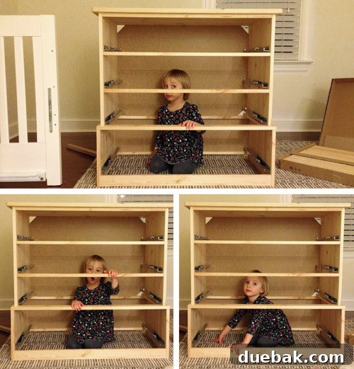 Clara helping assemble IKEA furniture