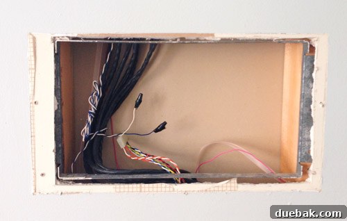 Artful Appetites 10 Capped phone jack wires inside the wall box, ready for concealment.
