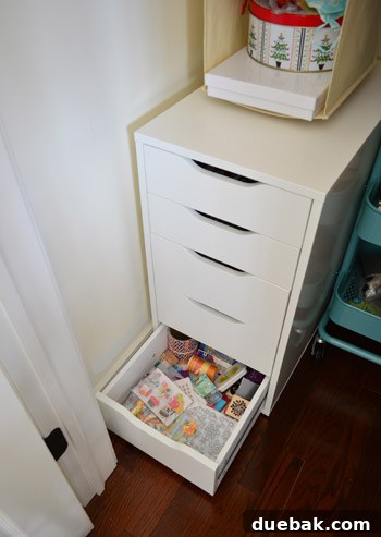Fifth drawer organized with stamps, ink pads, stickers, and washi tape