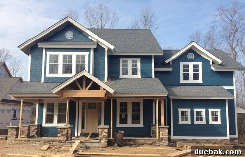 Habitat for Humanity showhouse with Newburg Green paint and Steam trim