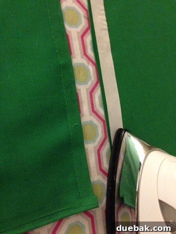 Joining crib skirt fabric panels using hem tape for a seamless finish