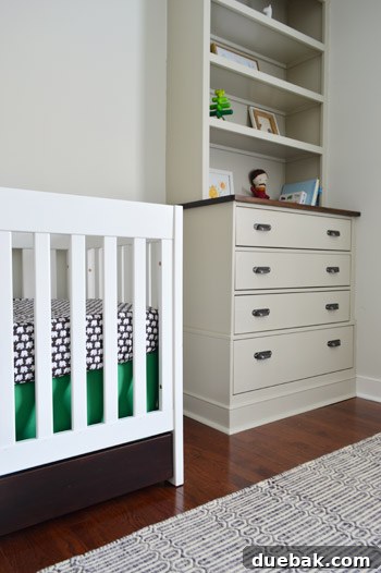 The completed crib with DIY crib skirt, adding a charming touch
