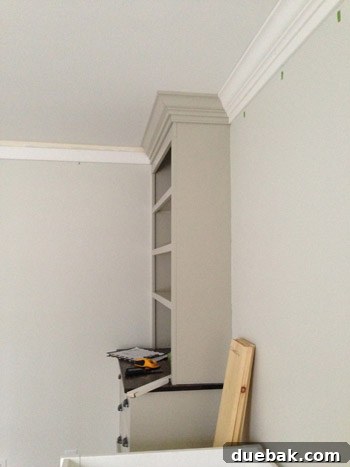 Pre-painting crown molding and baseboards for efficiency