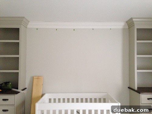 Crown molding after installation but before caulking and final paint touch-ups